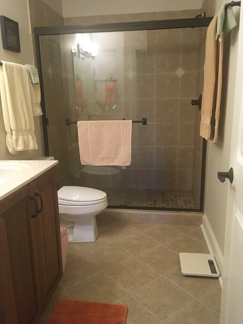 Large walk-in ceramic tiled shower.