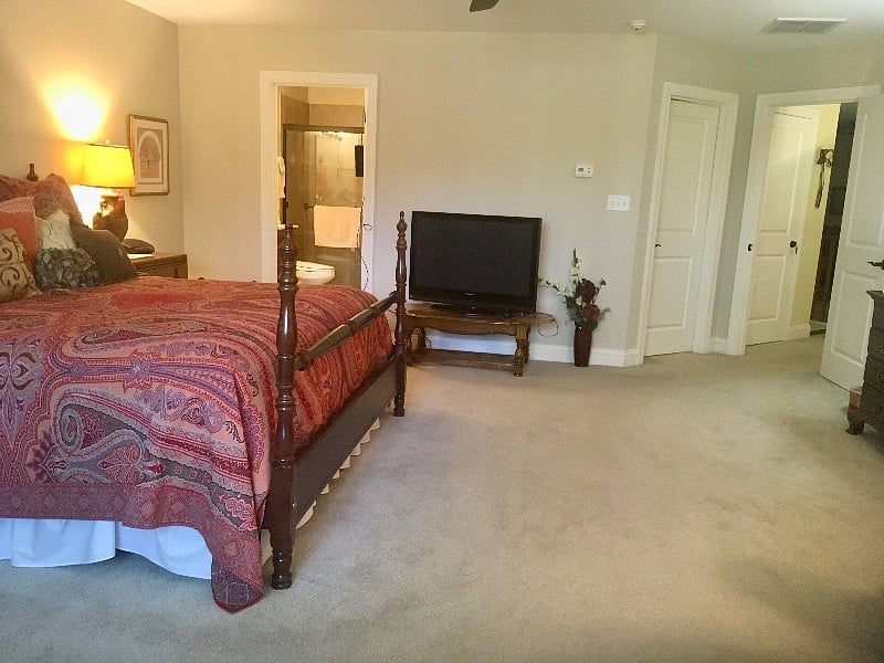 Enter into your huge bedroom with a very large 10 foot long walk-in closet and an ensuite bathroom. TV, overhead fan and light on remote.