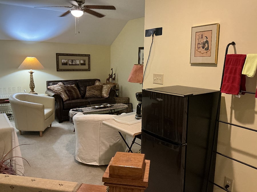 Small fridge/freezer & coffee station - then sitting area with TV