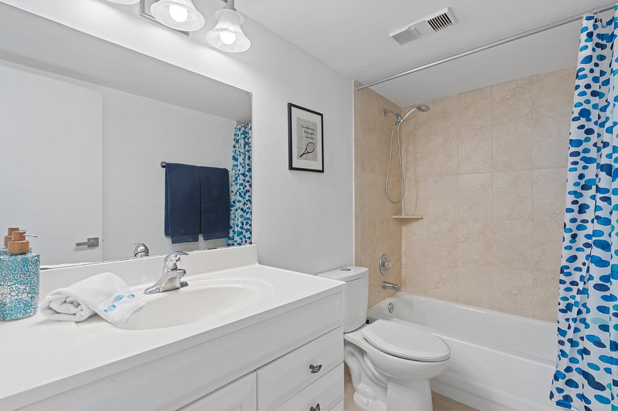 Full bath, right next to secondary bedroom