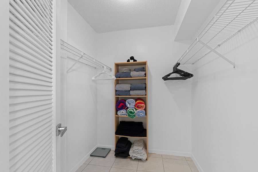 Primary bedroom walking closet
