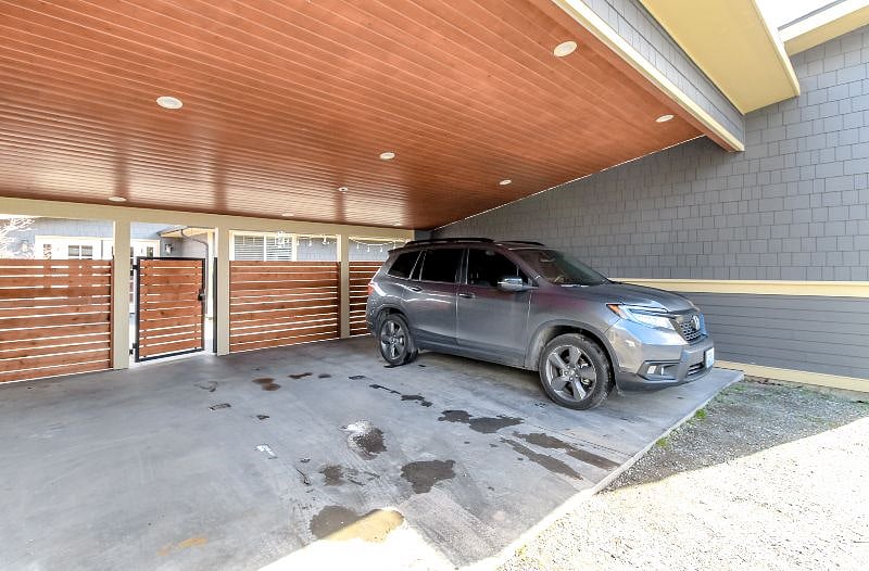 2 covered spots under carport, one goes to the main house the other spot goes to the ADU (Nurses Nest) 2 additional uncovered private spots one in front and one in back also go to the travelers.