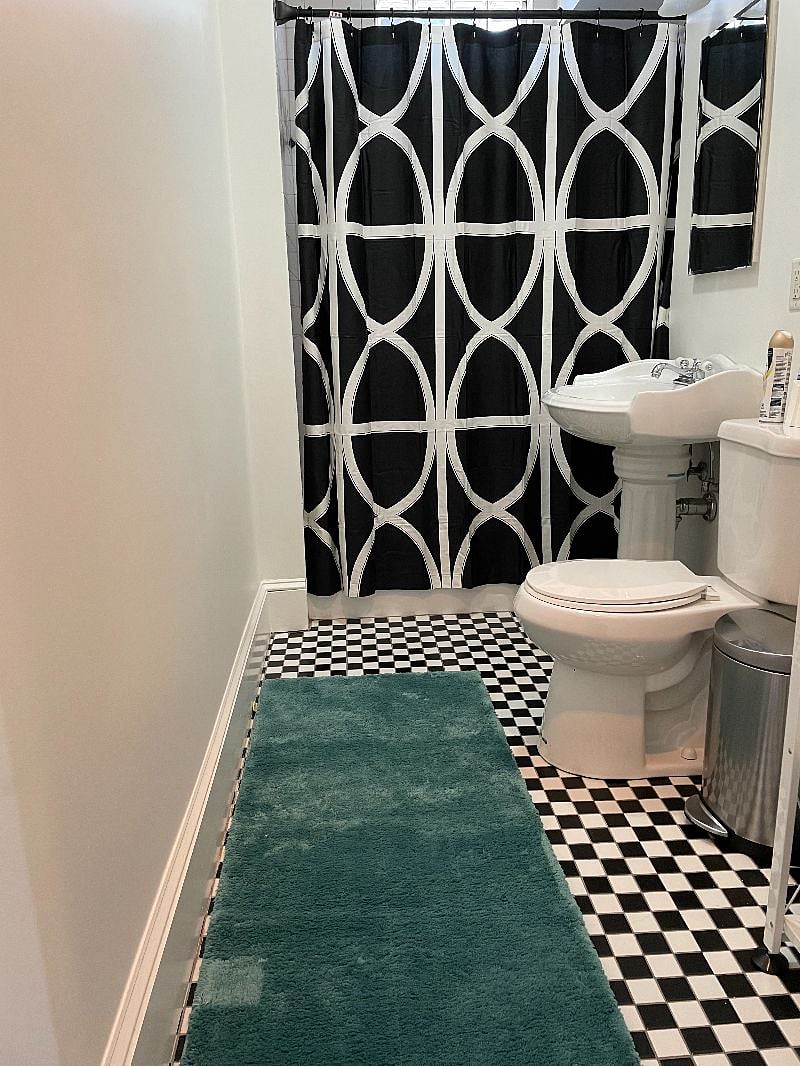 W/D located in the bathroom.