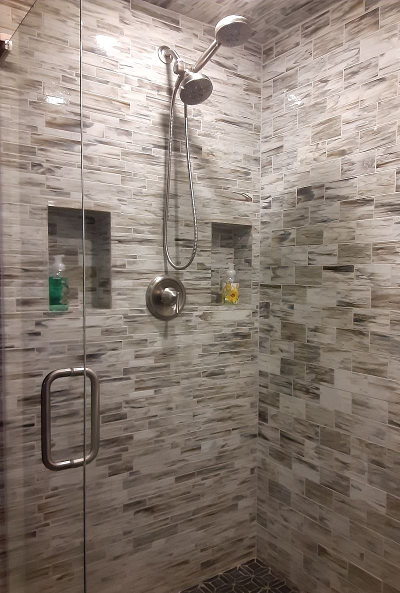 One of three showers available There is also a large garden bath tub for your pleasure that is adjacent to this shower..