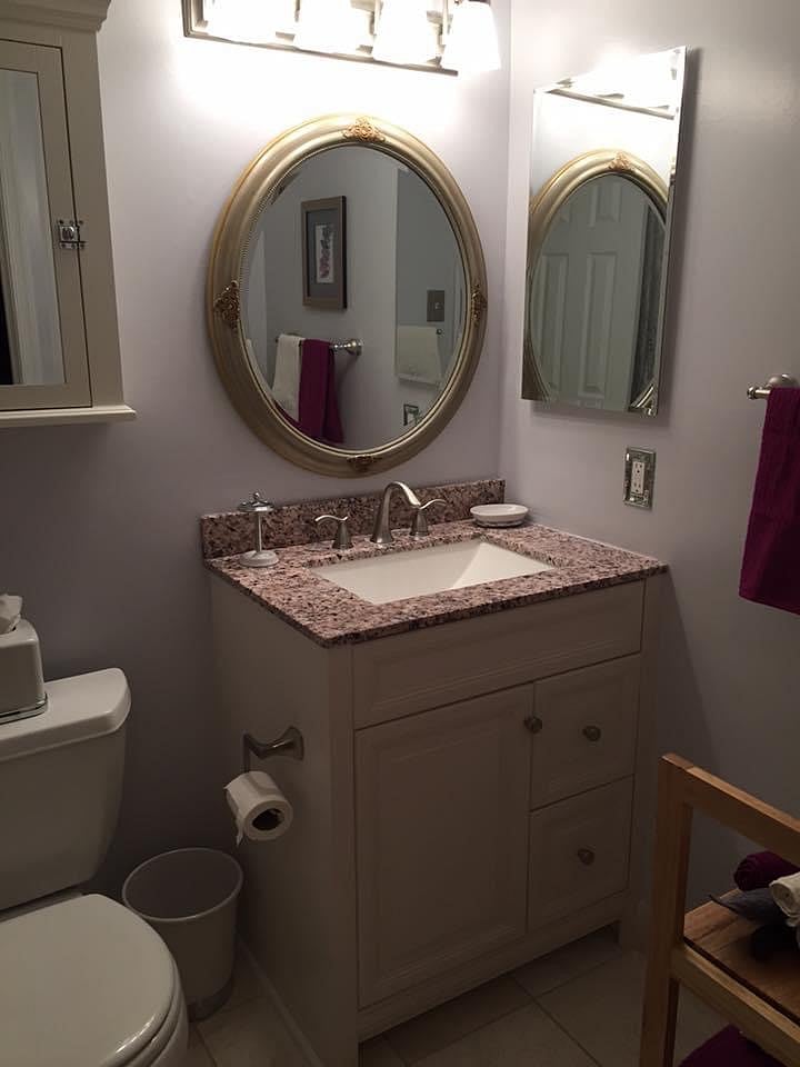 Newly remodeled bathroom with ample storage.