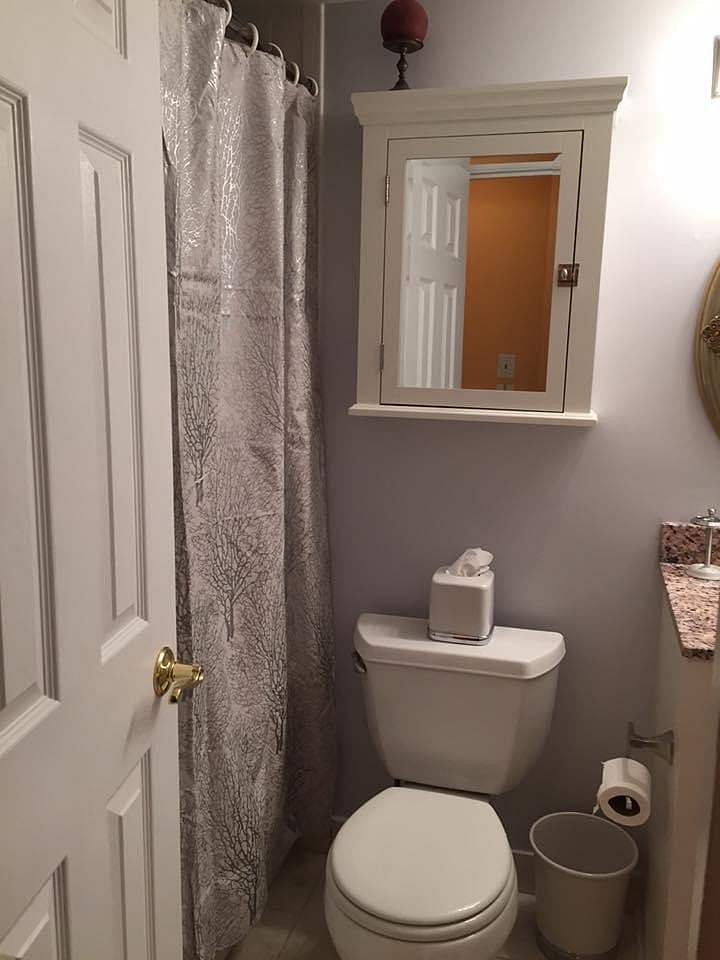 Newly remodeled bathroom with comfort height toilet.