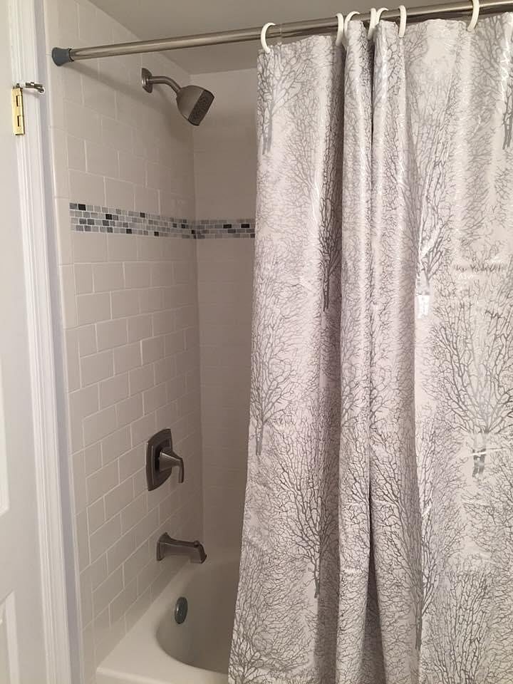 Newly remodeled bathroom with ample storage.