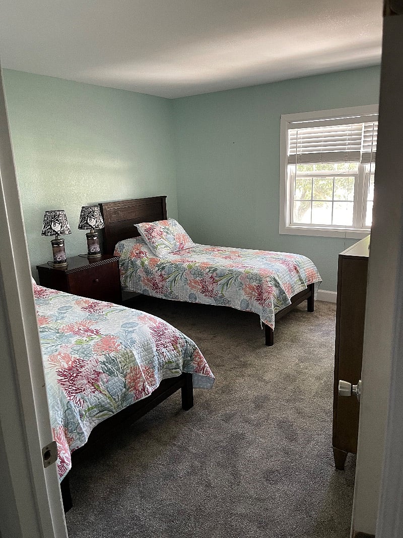Bedroom 1 with two single beds