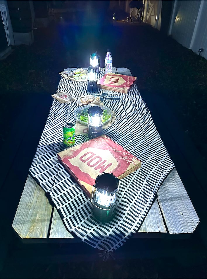 The most magical thing about this property is the way the outdoor space lights up at night. Call Mod Pizza and pick up your pizza before they have time to make it, then enjoy your night picnic! Lanterns, soft blankets and fancy lighting (beyond what is shown here) provided, along with two outdoor coolers.