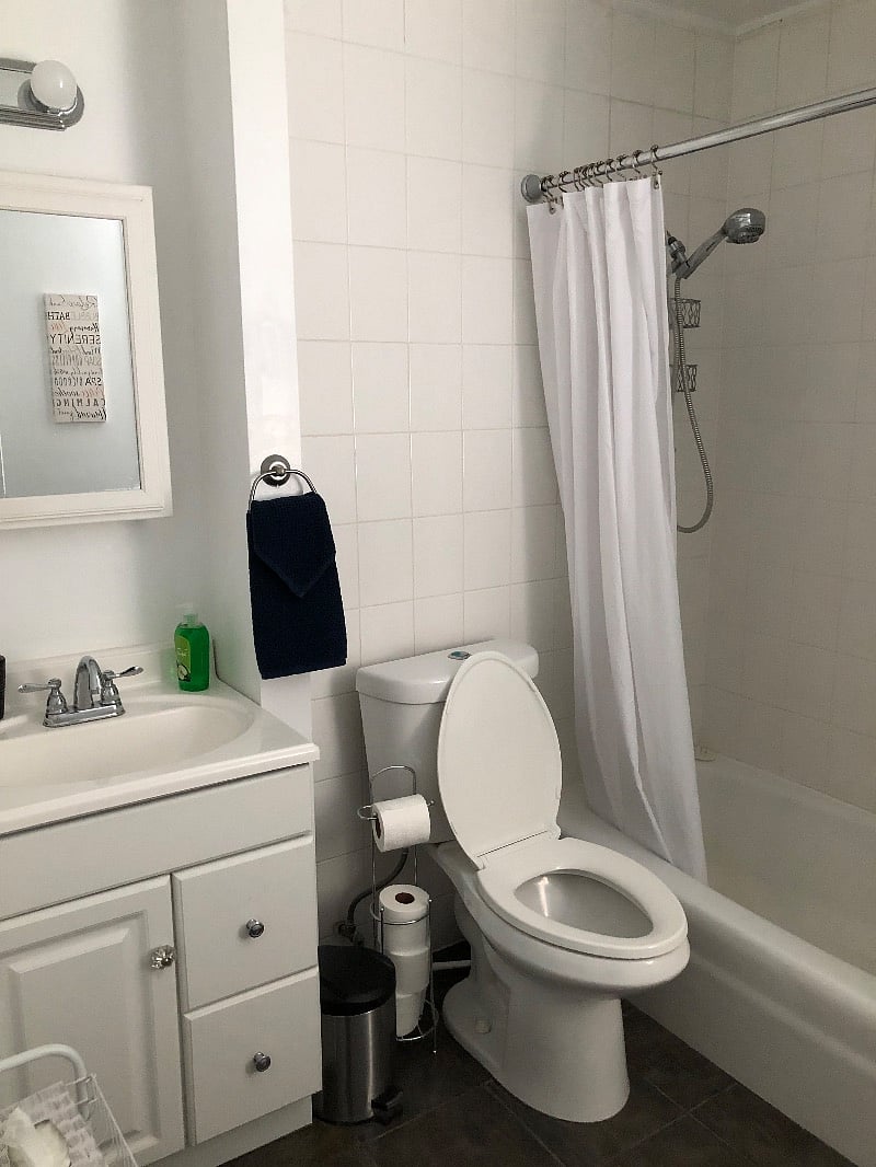 Full bath including hair dryer, towels, toiletries, fan.