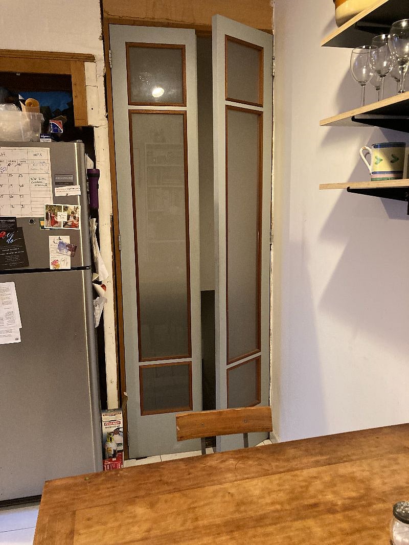 Doors to the downstairs available bedroom