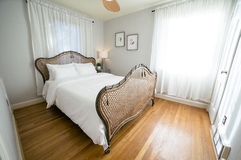 Sleep warmly in this main level tranquil bedroom featuring a queen sized bed with a brand new Nectar memory foam mattress and pillows, and a ceiling fan