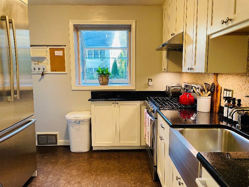Naturally lit kitchen with all the basic necessities, or door dash one of the many good eats in the surrounding area