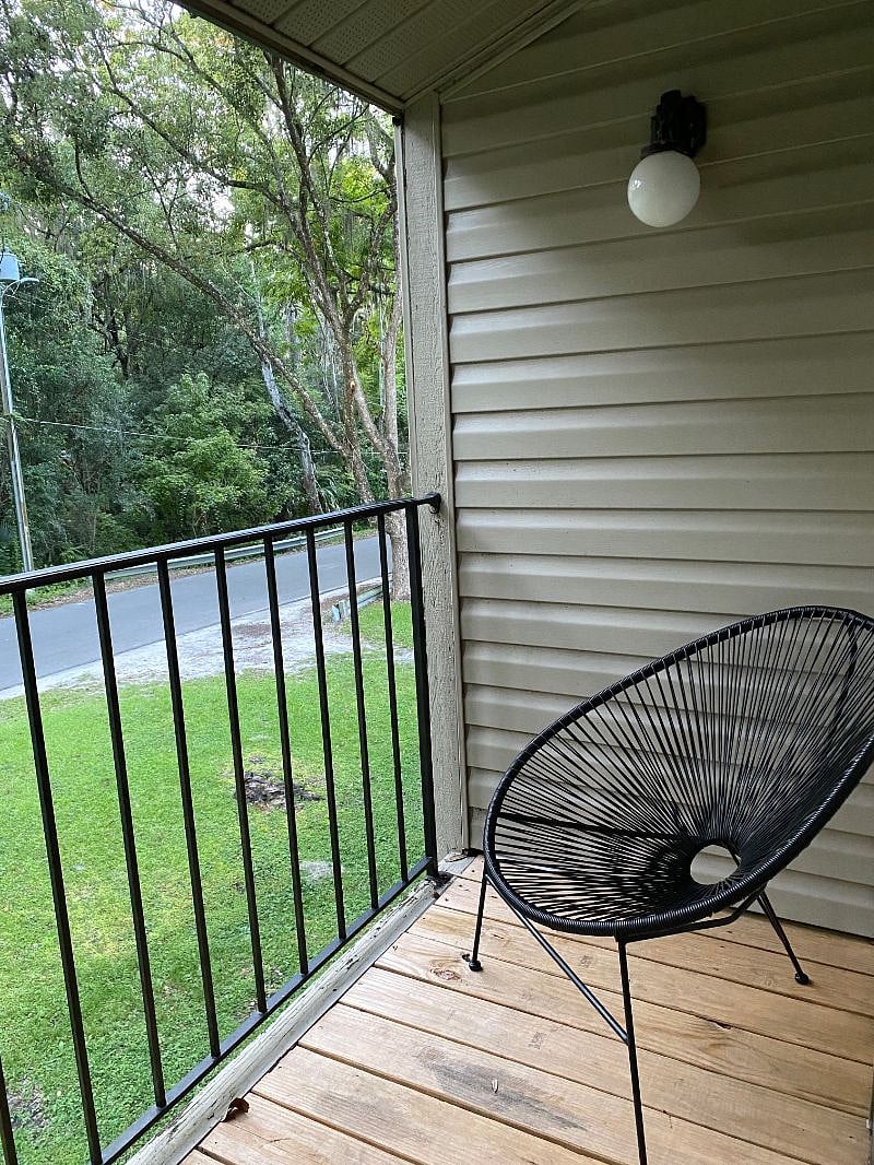 Balcony overlooking wooded preserve