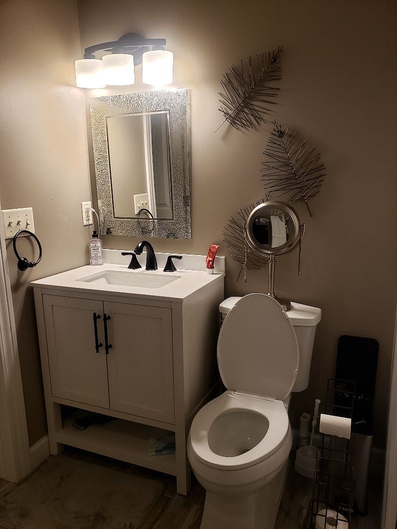 Private bathroom with lots of storage and towels provided