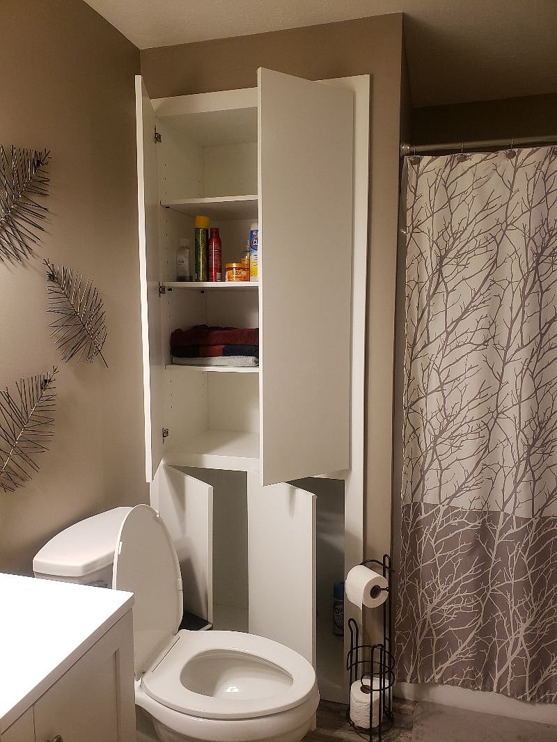 Generous cabinets and storage in bathroom.  Towels provided. 