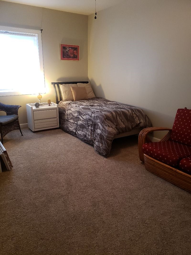 Single bed with reading area.