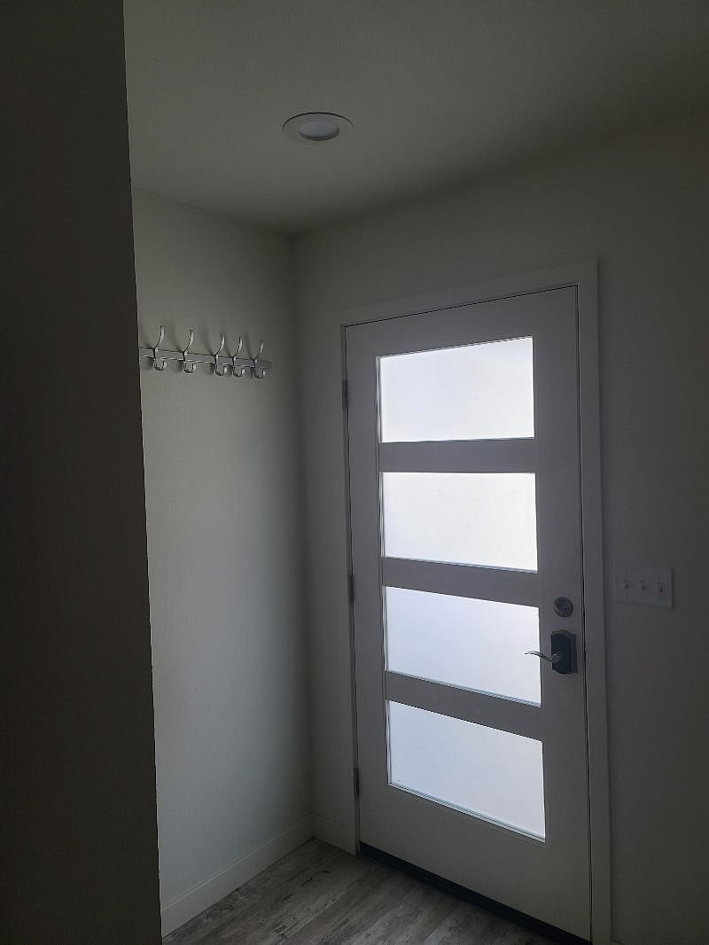 Front door with coat racks