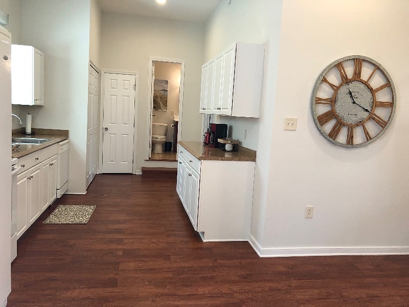 There is a huge storage closet to the left of the bathroom.