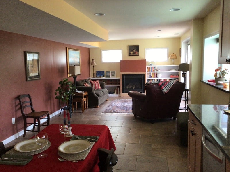 A view from the kitchen area showing the size of the main room. All the floors in the apartment except for the bedroom have large tile flooring.