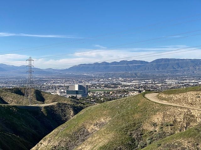 View of the neighborhood from a hiking/running path in the easily accessed hills around the property.