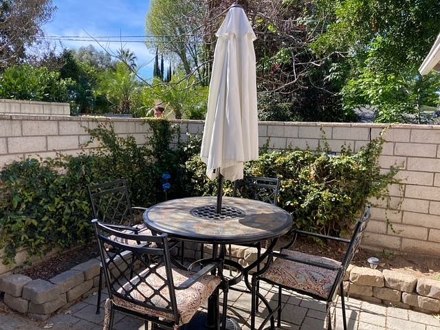 Private walled courtyard patio. New plantings have been added. Has year round hummingbirds.