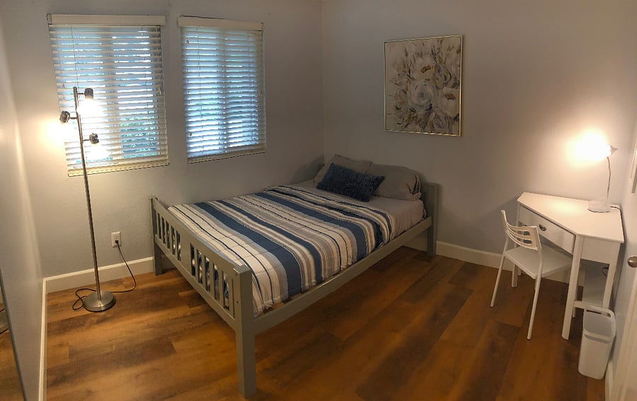This is the available bedroom. Updated furnishings will be coming! Room has a double mirrored sliding door closet.