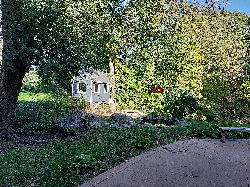 Back patio, manmade pond