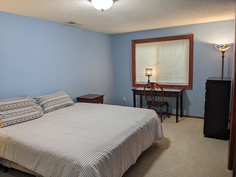 Second bedroom option includes a King size bed, desk, and dressers for storage.