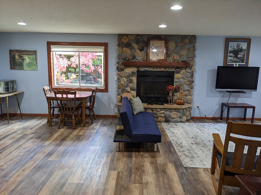 Dining and living room with gas fireplace and Smart TV