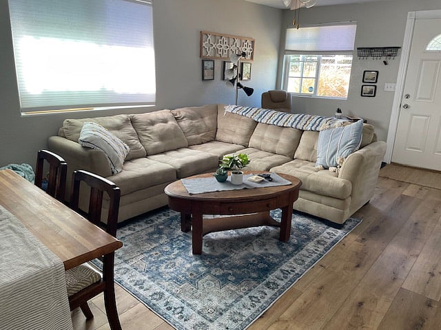 living room area, wide screen across from this seating area master