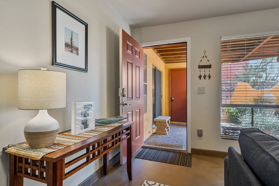 Step into our home through the charming gated courtyard, offering both privacy and a warm welcome.
