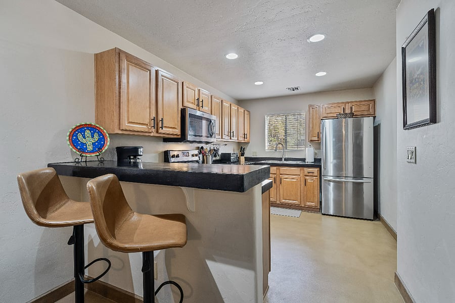 Pull up a comfy barstool and cozy up to the kitchen bar for a relaxed dining or chatting experience.