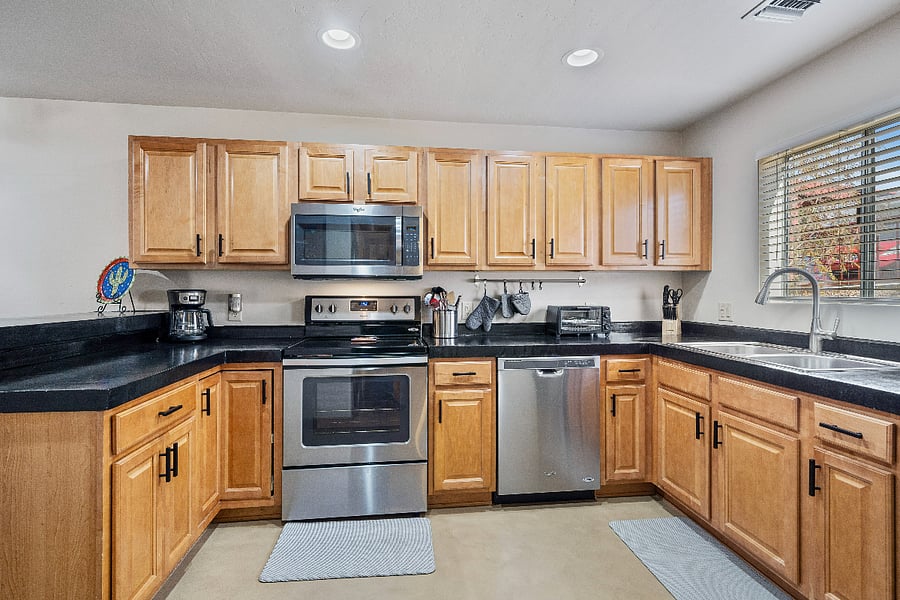 Our spacious and well-equipped kitchen provides plenty of counter space, making it easy to prepare meals, entertain, and enjoy cooking during your stay.
