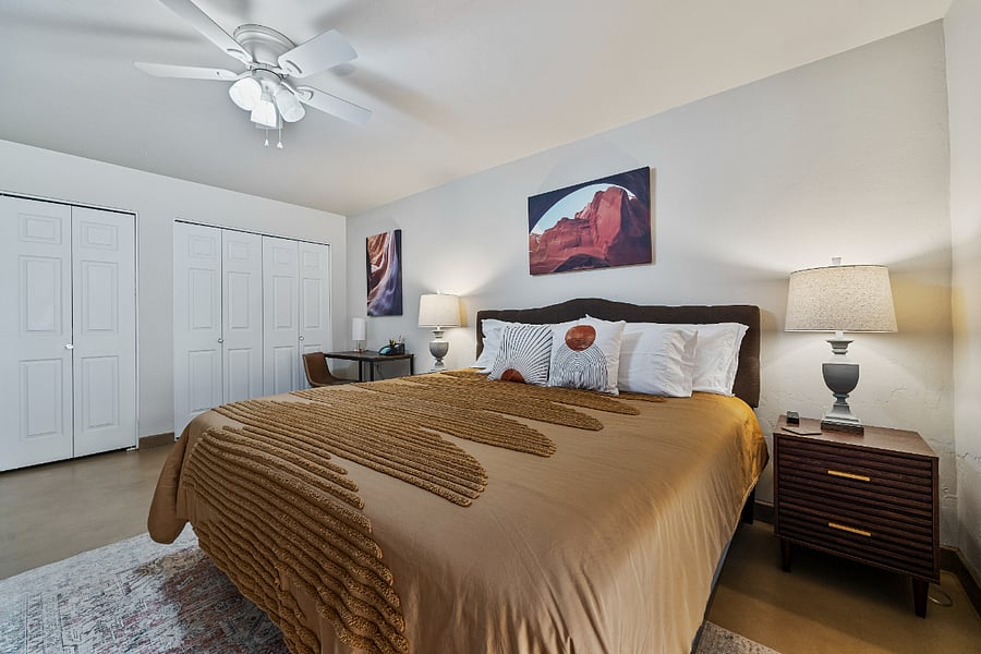 Our inviting primary bedroom boasts a luxurious king-sized bed with a Tempur-Pedic mattress, ensuring a restful and comfortable night's sleep.