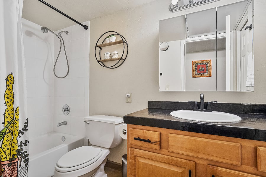 Our bathroom offers a convenient bath/shower combination and plenty of storage space to keep all your essentials organized during your stay.