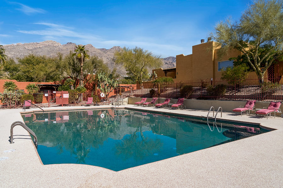 Immerse yourself in the beauty of the pool area, adorned with stunning mountain views. This picturesque setting enhances the enjoyment of your time by the pool, creating a serene and breathtaking atmosphere.