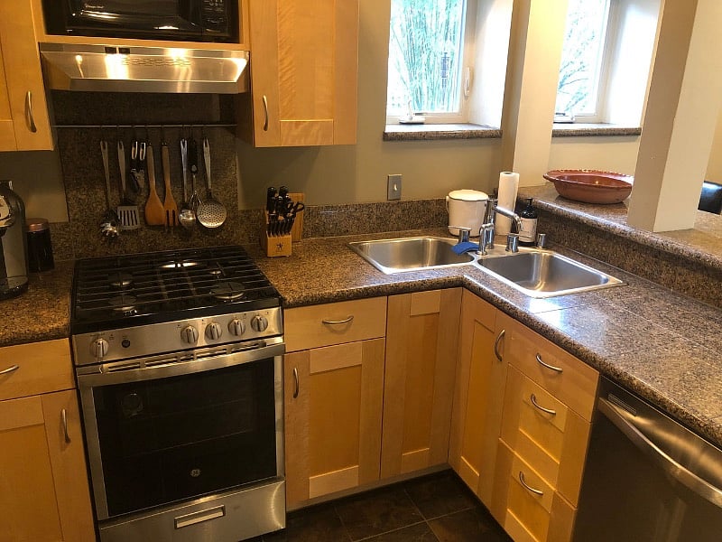 Lots of cabinet and countertop space, gas range, dishwasher, full size refrigerator, and disposal.