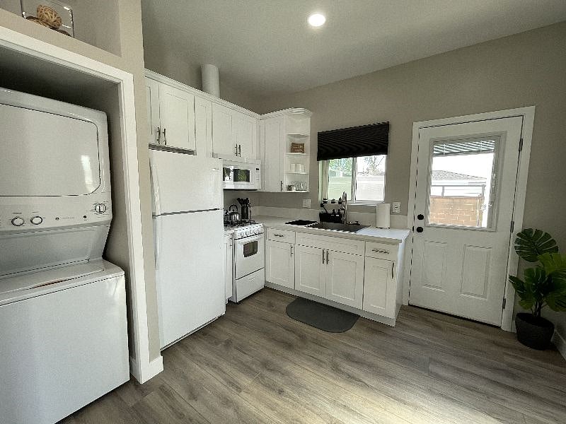 Studio is equipped with its own stacked washer and dryer unit.