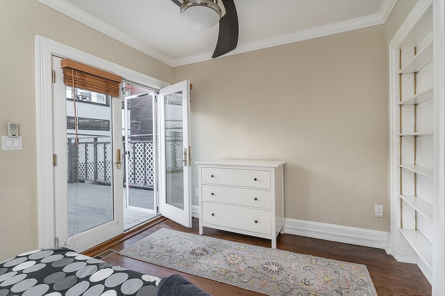 back bedroom with entrance to patio