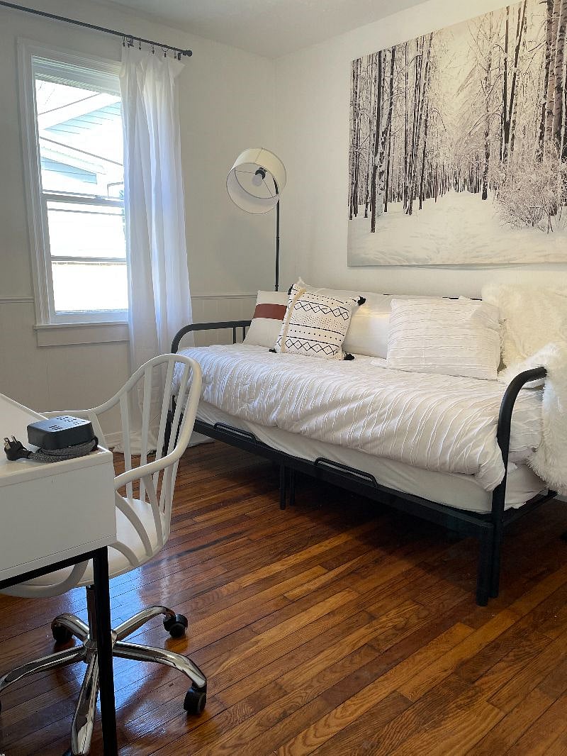 Second bedroom with twin bed for additional seating or sleeping.