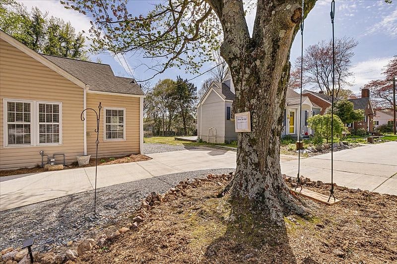 Front entry of this Midtown Greensboro furnished rental offering walkable access to Downtown, Cone Health, public transit, and the Downtown Greenway Urban Trail.