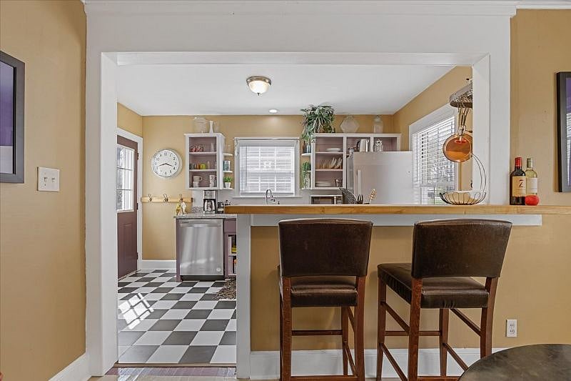 Kitchen view showing functional layout, storage, and everyday usability for travel nurses and professionals staying 30 days or longer in Greensboro.