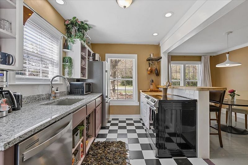 Fully equipped kitchen at Hunsuckers Place designed for real cooking during long-term and mid-term stays, located near Downtown Greensboro and Cone Hospital.