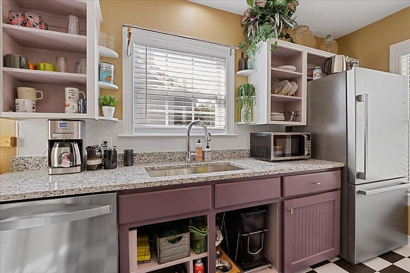 Kitchen view showing functional layout, storage, and everyday usability for travel nurses and professionals staying 30 days or longer in Greensboro.