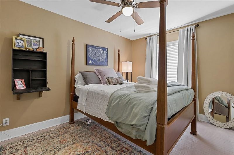 Bedroom workspace option offering a quiet place for laptop work or reading, supporting remote work and extended-stay living in Midtown Greensboro.