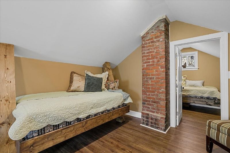 Additional bonus or attic space offering flexible use for reading, remote work, or relaxation during longer furnished stays in Greensboro.