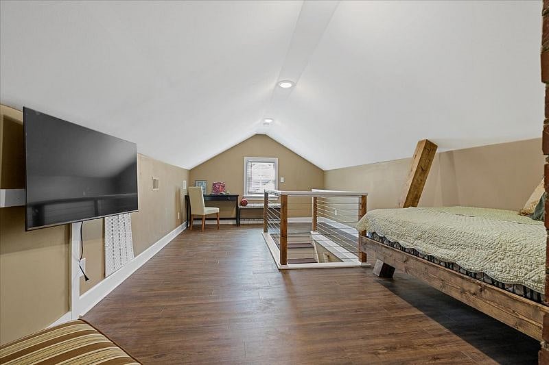 Additional bonus or attic space offering flexible use for reading, remote work, or relaxation during longer furnished stays in Greensboro.