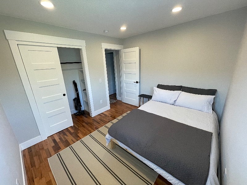 Bedroom 3 with full size bed. Great to use as a guest room, office or extra storage.