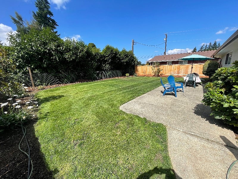 New landscaped backyard, lawn maintenance included!